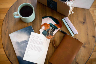 The Pearl Project Mental Health Kit, journal, card deck, and accessories on Table