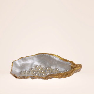 Another angle of oyster shell with pearls.